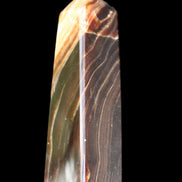 Chocolate Calcite obelisk 78*29*18mm 84g in sunlight - Rocks and Things Store