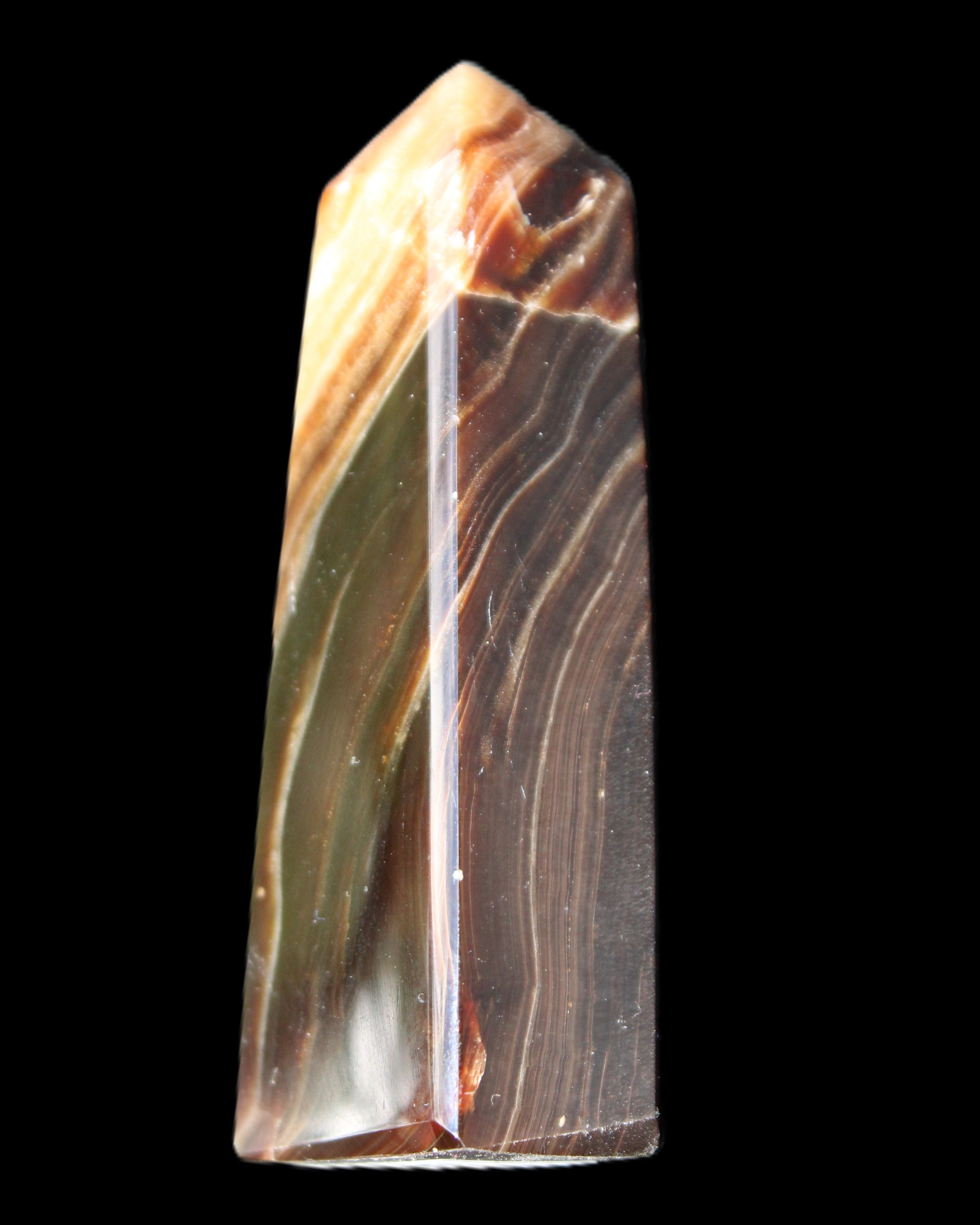 Chocolate Calcite obelisk 78*29*18mm 84g in sunlight - Rocks and Things Store