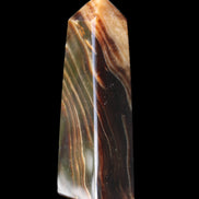 Chocolate Calcite obelisk 78*29*18mm 84g in sunlight - Rocks and Things Store