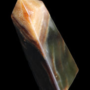 Chocolate Calcite obelisk 78*29*18mm 84g in sunlight - Rocks and Things Store