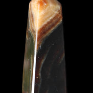 Chocolate Calcite obelisk 78*29*18mm 84g in sunlight - Rocks and Things Store