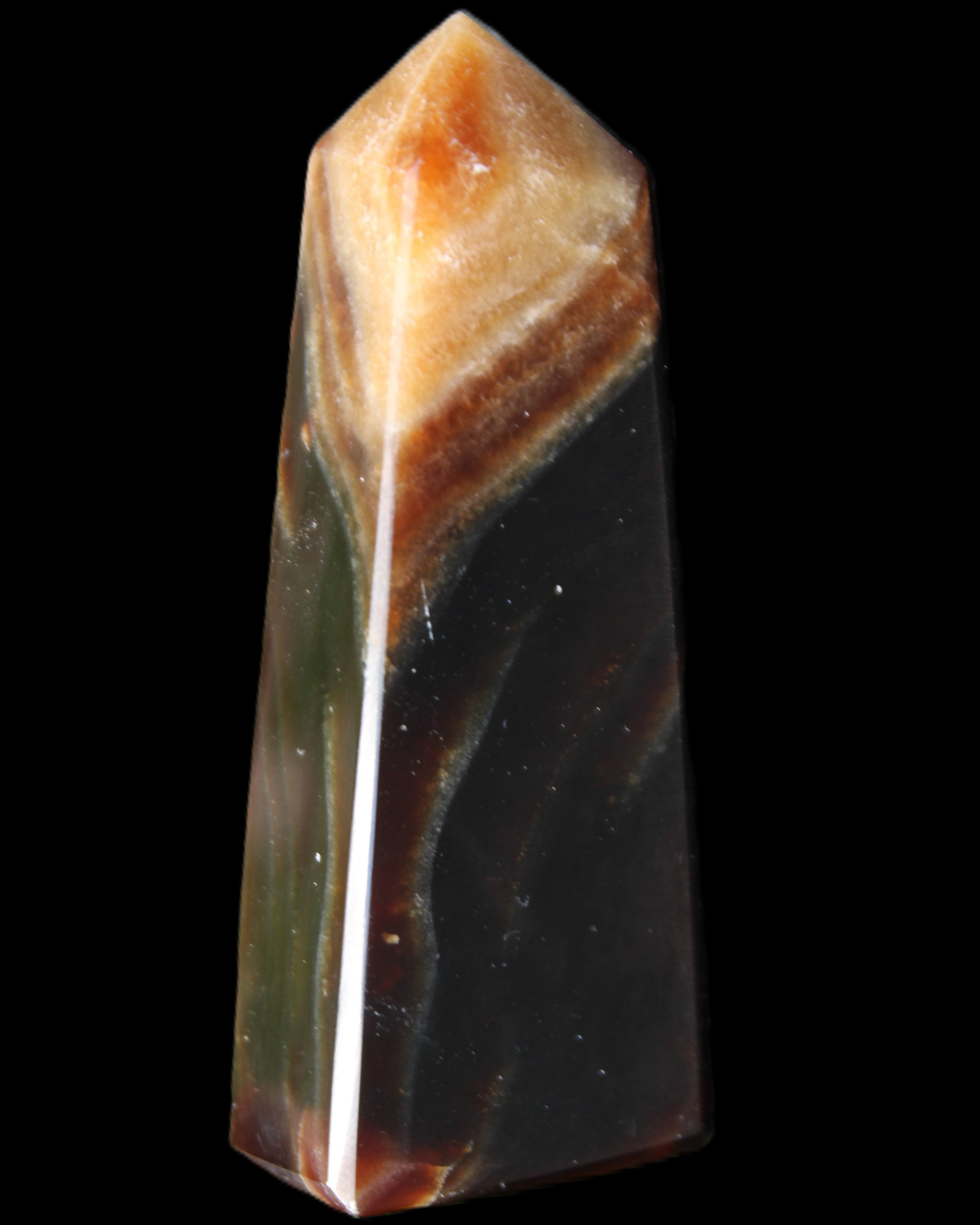 Chocolate Calcite obelisk 78*29*18mm 84g in sunlight - Rocks and Things Store