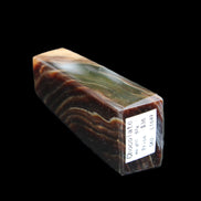 Chocolate Calcite obelisk 78*29*18mm 84g in sunlight - Rocks and Things Store