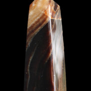 Chocolate Calcite obelisk 78*29*18mm 84g in sunlight - Rocks and Things Store