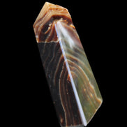 Chocolate Calcite obelisk 78*29*18mm 84g in sunlight - Rocks and Things Store