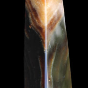 Chocolate Calcite obelisk 78*29*18mm 84g in sunlight - Rocks and Things Store