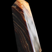 Chocolate Calcite obelisk 78*29*18mm 84g in sunlight - Rocks and Things Store