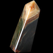 Chocolate Calcite obelisk 78*29*18mm 84g in sunlight - Rocks and Things Store
