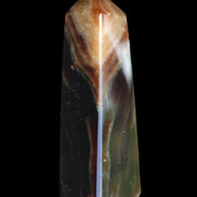 Chocolate Calcite obelisk 78*29*18mm 84g in sunlight - Rocks and Things Store