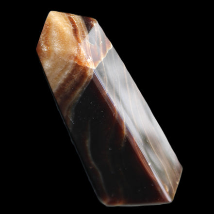 Chocolate Calcite obelisk 78*29*18mm 84g in sunlight - Rocks and Things Store
