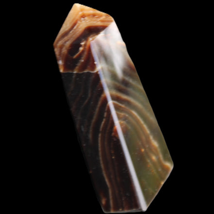 Chocolate Calcite obelisk 78*29*18mm 84g in sunlight - Rocks and Things Store