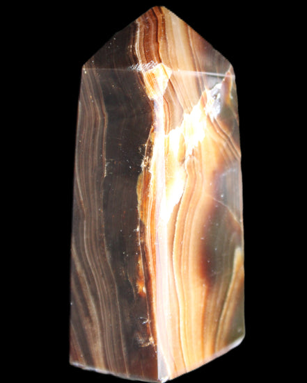 Chocolate Calcite obelisk 62*25*21mm 73g in sunlight - Rocks and Things Store