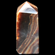 Chocolate Calcite obelisk 62*25*21mm 73g in sunlight - Rocks and Things Store