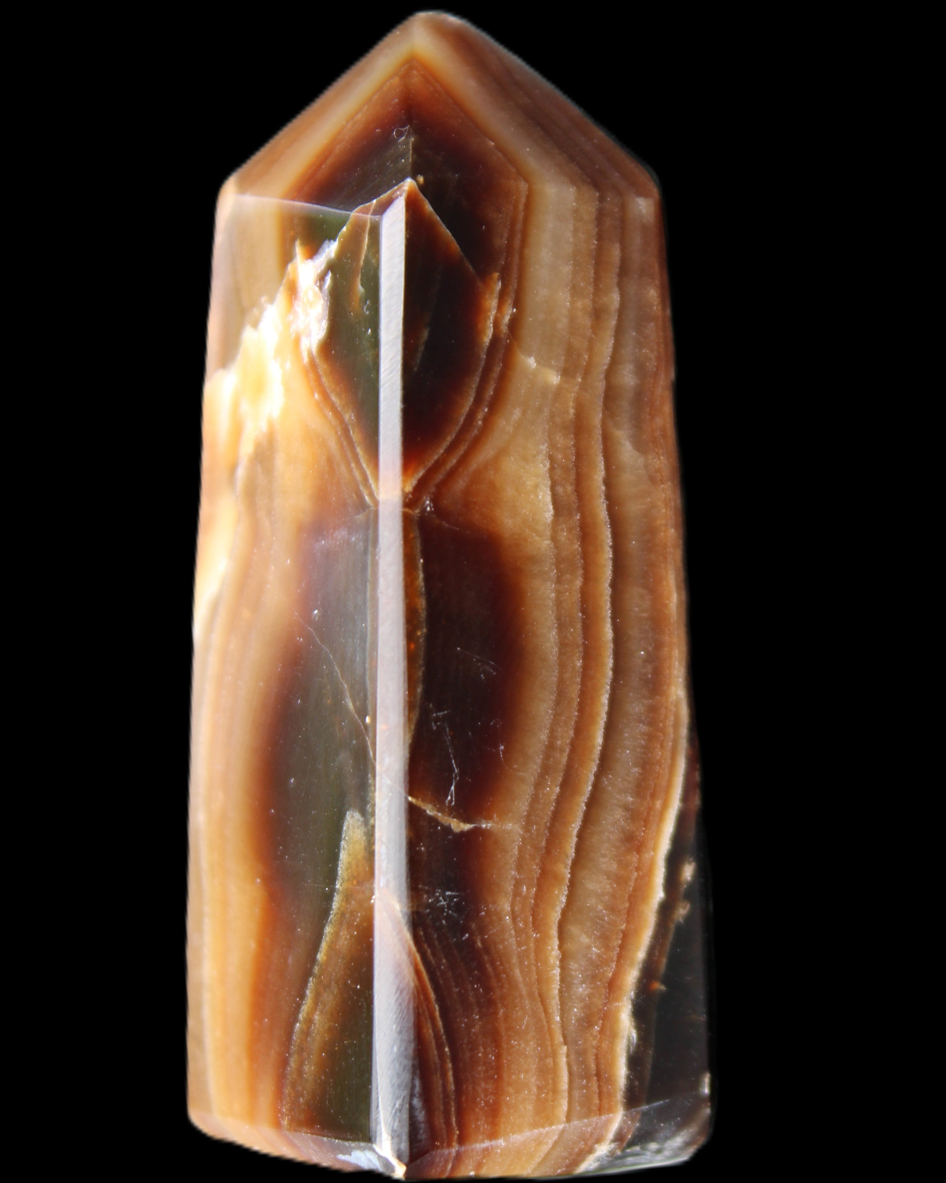 Chocolate Calcite obelisk 62*25*21mm 73g in sunlight - Rocks and Things Store