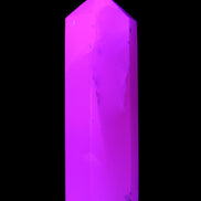Mangano Calcite UV-reactive obelisk 92mm 157g in sunlight - Rocks and Things Store