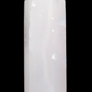 Mangano Calcite UV-reactive obelisk 92mm 157g in sunlight - Rocks and Things Store