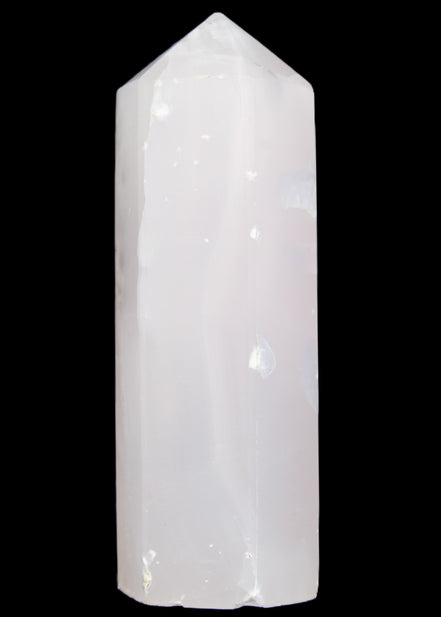 Mangano Calcite UV-reactive obelisk 92mm 157g in sunlight - Rocks and Things Store