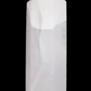 Mangano Calcite UV-reactive obelisk 92mm 157g in sunlight - Rocks and Things Store