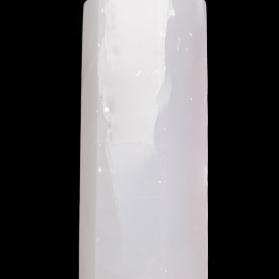 Mangano Calcite UV-reactive obelisk 92mm 157g in sunlight - Rocks and Things Store
