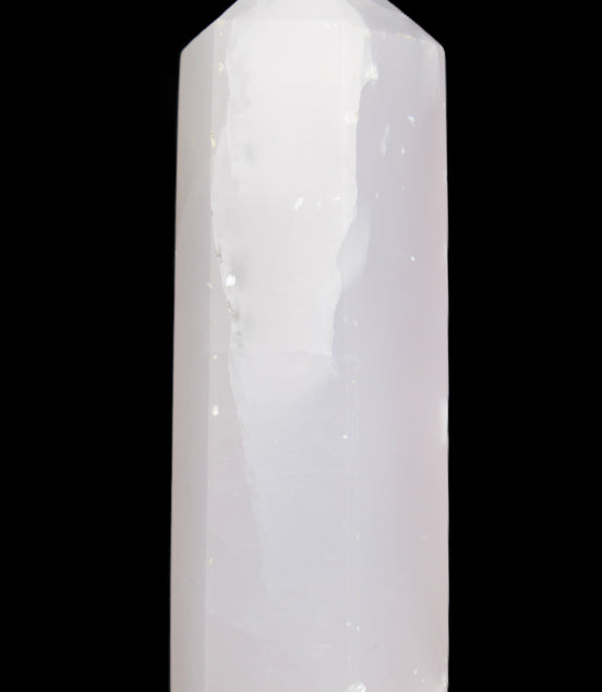 Mangano Calcite UV-reactive obelisk 92mm 157g in sunlight - Rocks and Things Store