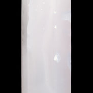 Mangano Calcite UV-reactive obelisk 92mm 157g in sunlight - Rocks and Things Store