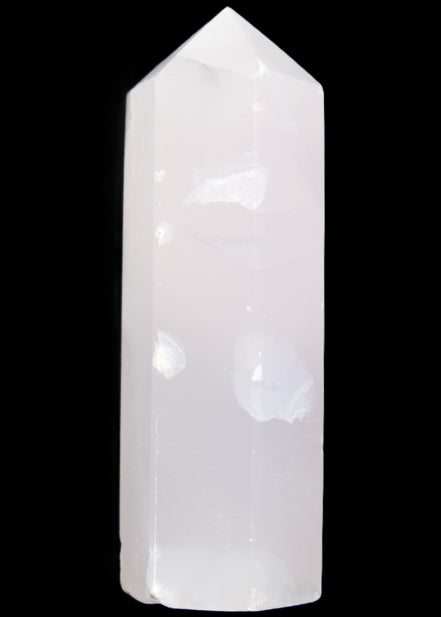 Mangano Calcite UV-reactive obelisk 92mm 157g in sunlight - Rocks and Things Store