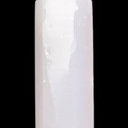 Mangano Calcite UV-reactive obelisk 92mm 157g in sunlight - Rocks and Things Store