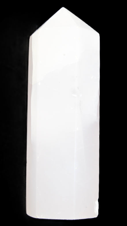 Mangano Calcite UV-reactive obelisk 92mm 157g in sunlight - Rocks and Things Store