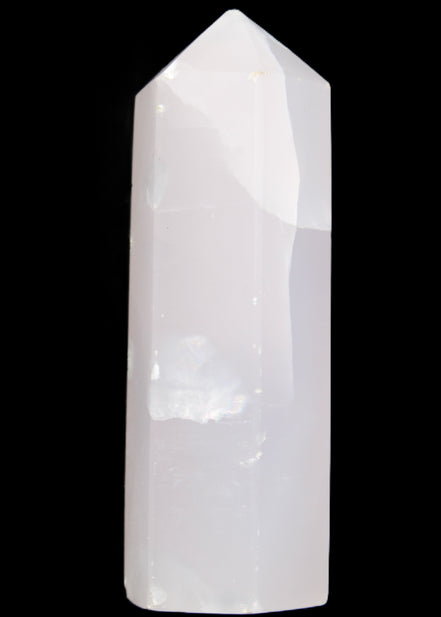 Mangano Calcite UV-reactive obelisk 92mm 157g in sunlight - Rocks and Things Store
