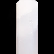 Mangano Calcite UV-reactive obelisk 92mm 157g in sunlight - Rocks and Things Store