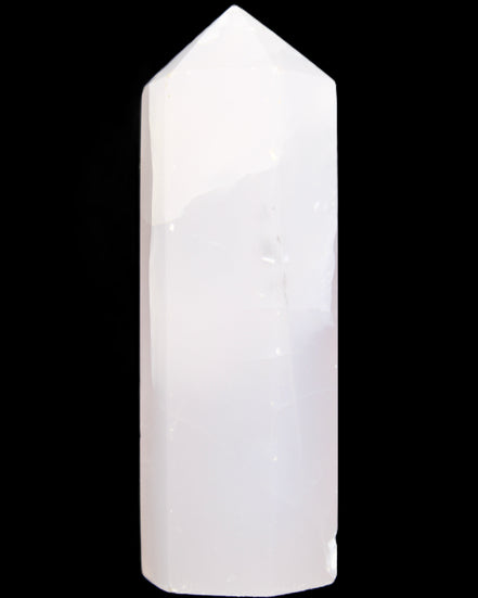 Mangano Calcite UV-reactive obelisk 92mm 157g in sunlight - Rocks and Things Store