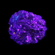 Chalcopyrite cluster from Pakistan 40*32*32mm 95g in UV light - Rocks and Things Store