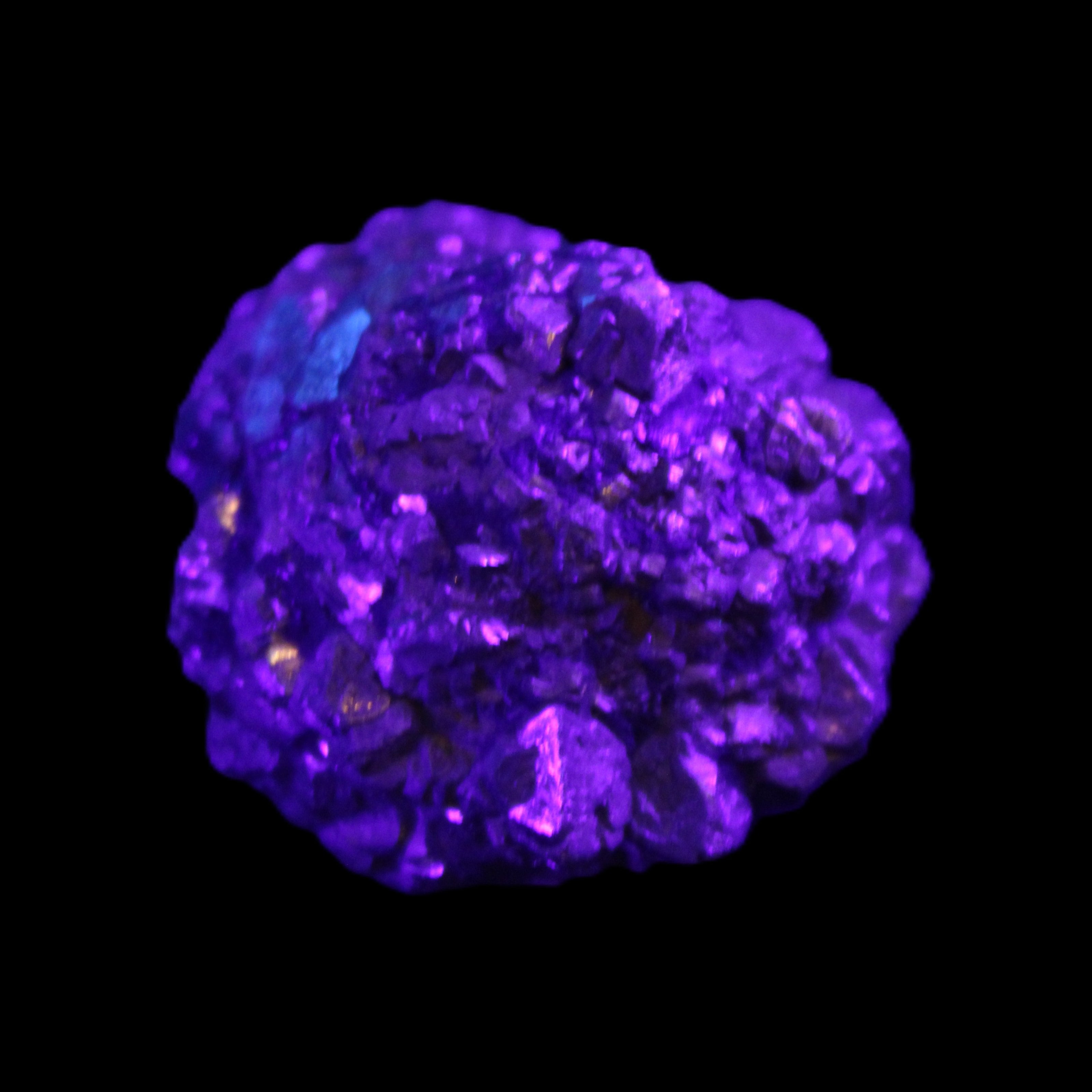 Chalcopyrite cluster from Pakistan 40*32*32mm 95g in UV light - Rocks and Things Store