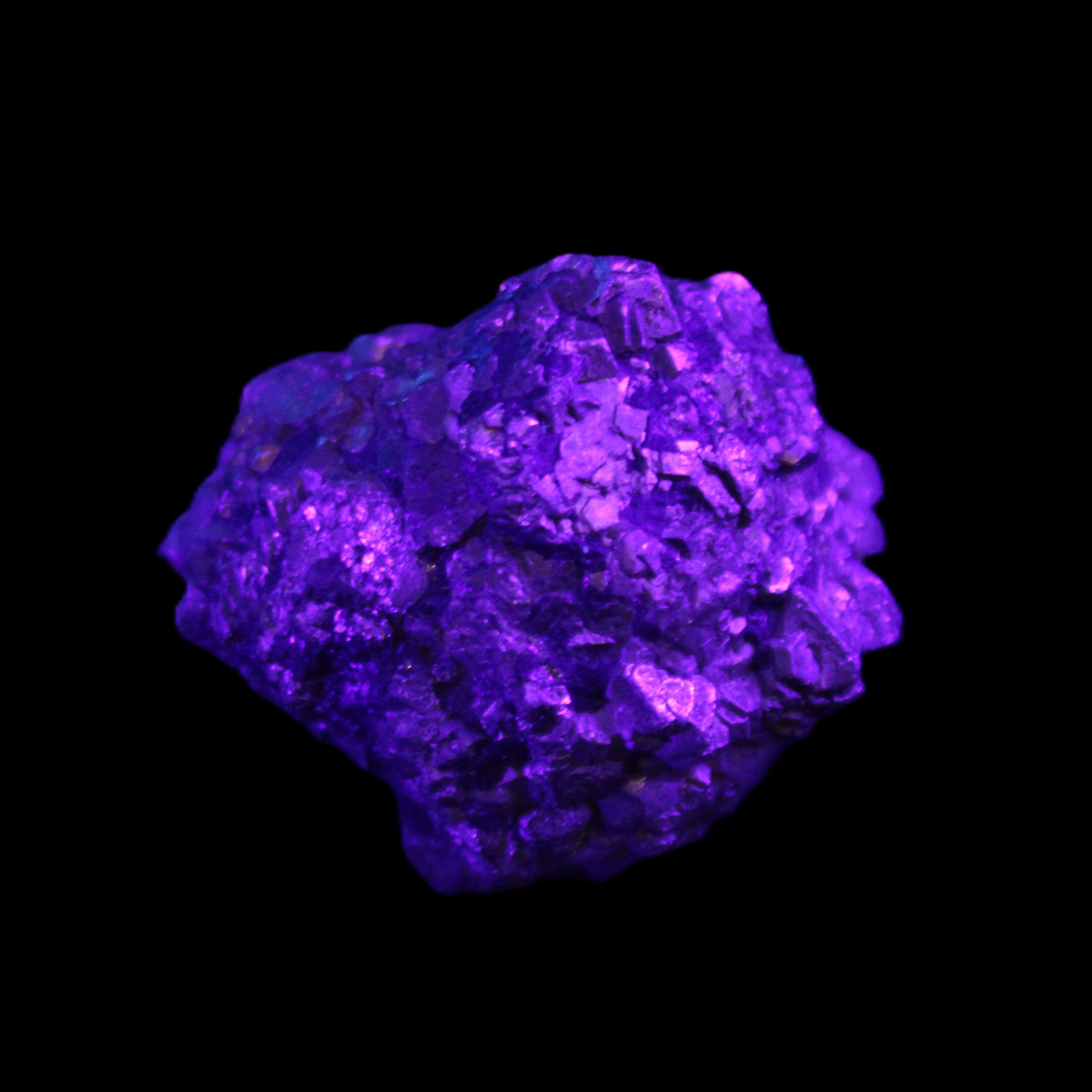 Chalcopyrite cluster from Pakistan 40*32*32mm 95g in UV light - Rocks and Things Store