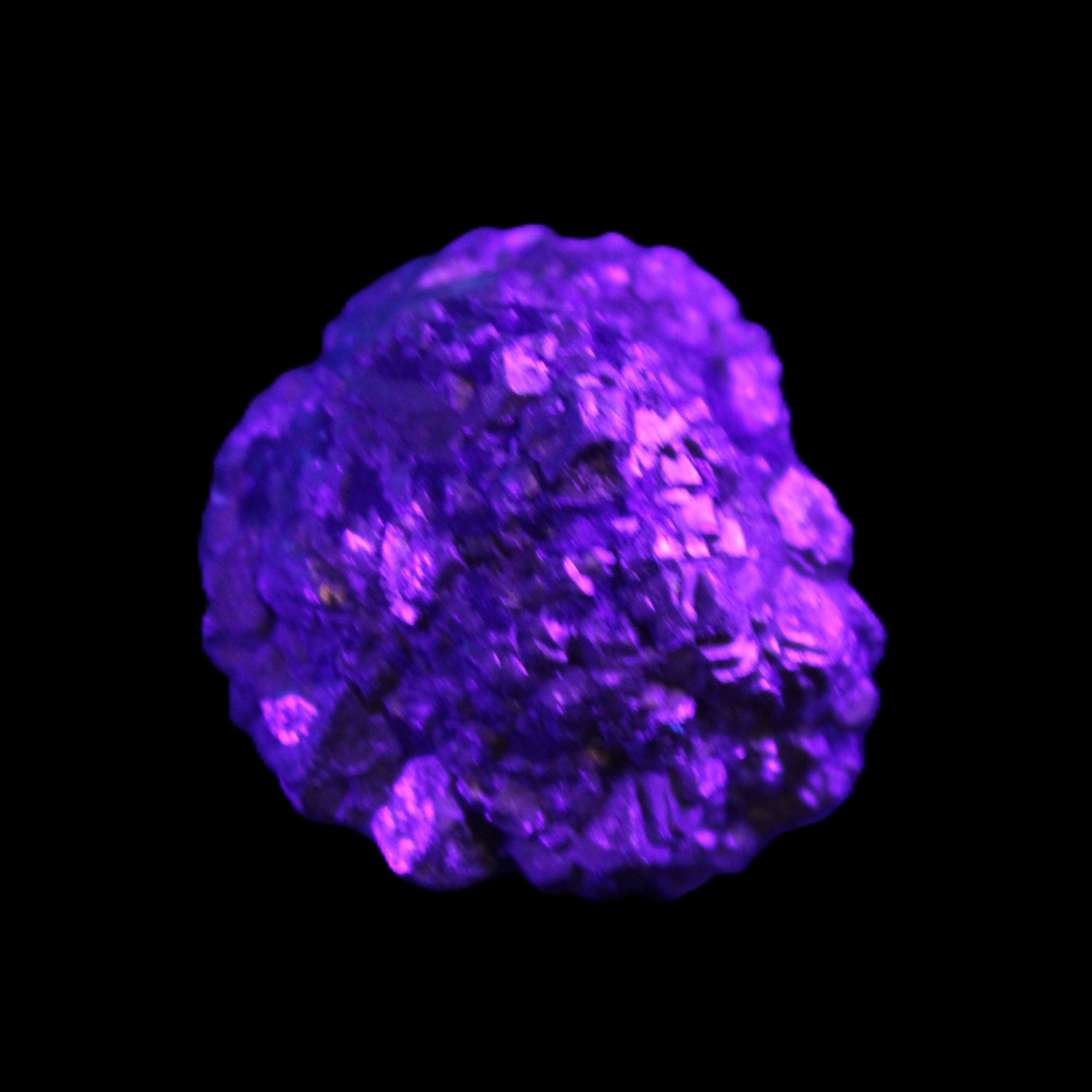 Chalcopyrite cluster from Pakistan 40*32*32mm 95g in UV light - Rocks and Things Store