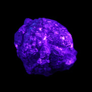 Chalcopyrite cluster from Pakistan 40*30*31mm 86.3g in UV light - Rocks and Things Store