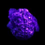 Chalcopyrite cluster from Pakistan 40*32*25mm 80.0g in UV light - Rocks and Things Store