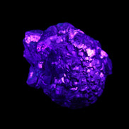 Chalcopyrite cluster from Pakistan 40*32*25mm 80.0g in UV light - Rocks and Things Store