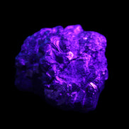 Chalcopyrite cluster from Pakistan 40*32*32mm 95g in UV light - Rocks and Things Store