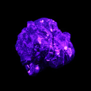 Chalcopyrite cluster from Pakistan 40*32*32mm 95g in UV light - Rocks and Things Store