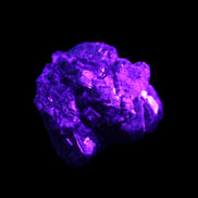 Chalcopyrite cluster from Pakistan 40*32*32mm 95g in UV light - Rocks and Things Store