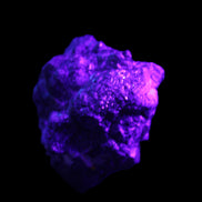 Chalcopyrite cluster from Pakistan 40*32*32mm 95g in UV light - Rocks and Things Store