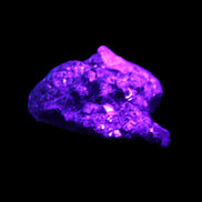 Chalcopyrite cluster from Pakistan 40*32*32mm 95g in UV light - Rocks and Things Store