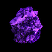 Red Zircon, Spessartine, Tourmaline on Epidote & Feldspar specimen 28*25*28mm 21g in UV light - Rocks and Things Store