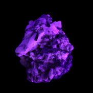 Red Zircon, Spessartine, Tourmaline on Epidote & Feldspar specimen 28*25*28mm 21g in UV light - Rocks and Things Store