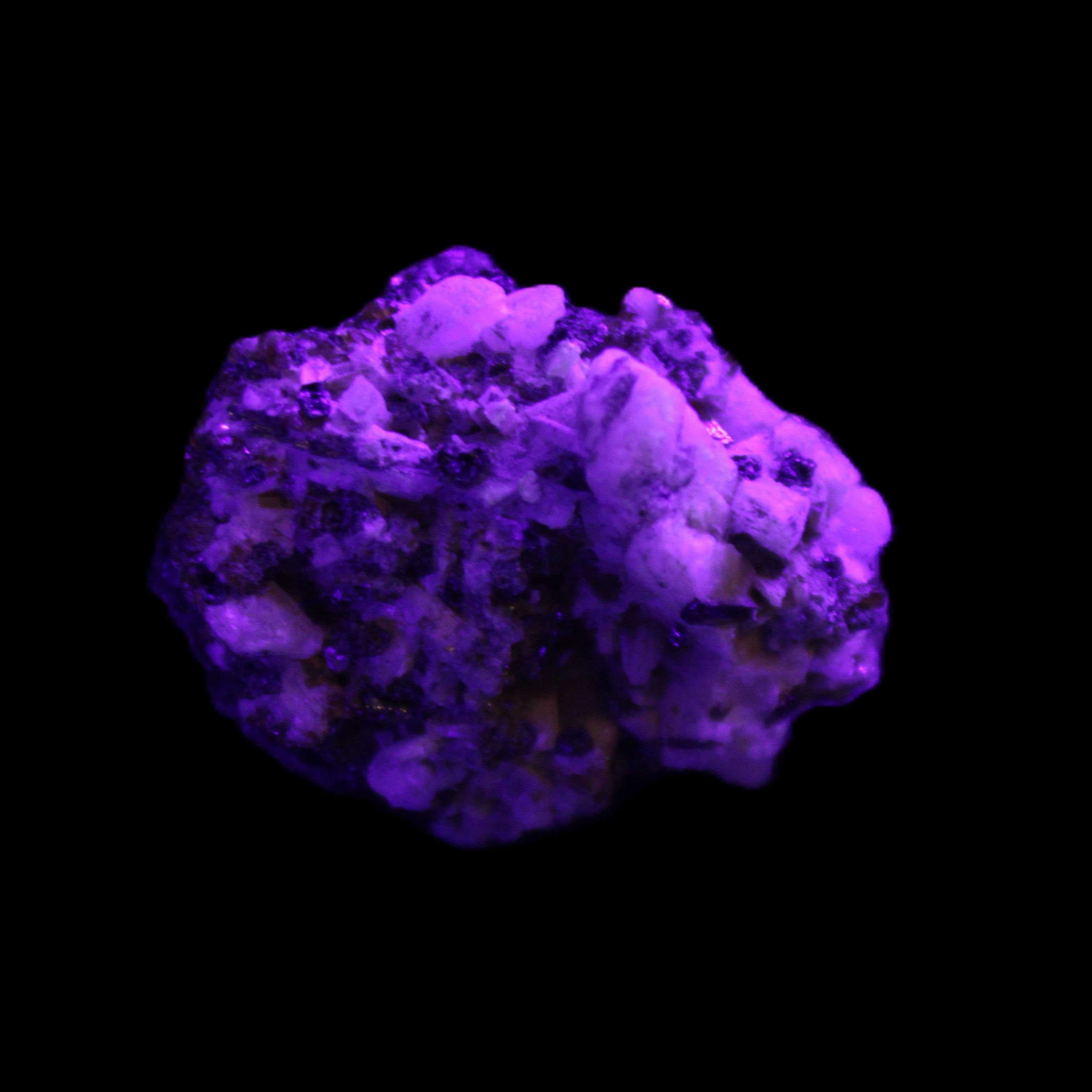 Red Zircon, Spessartine, Tourmaline on Epidote & Feldspar specimen 28*25*28mm 21g in UV light - Rocks and Things Store