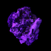 Red Zircon, Spessartine, Tourmaline on Epidote & Feldspar specimen 28*25*28mm 21g in UV light - Rocks and Things Store