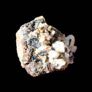 Red Zircon, Spessartine, Tourmaline on Epidote & Feldspar specimen 28*25*28mm 21g in sunlight - Rocks and Things Store