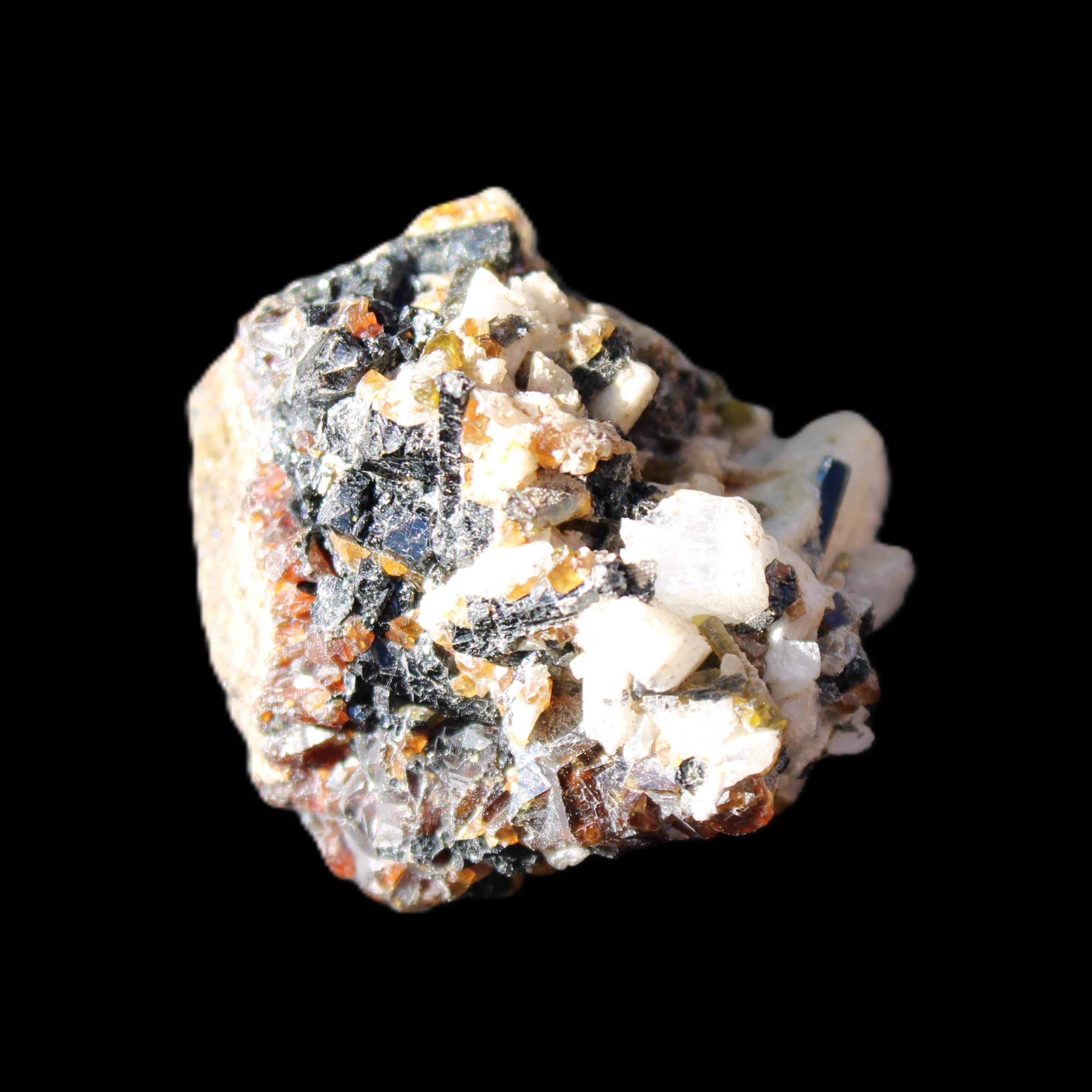 Red Zircon, Spessartine, Tourmaline on Epidote & Feldspar specimen 28*25*28mm 21g in sunlight - Rocks and Things Store