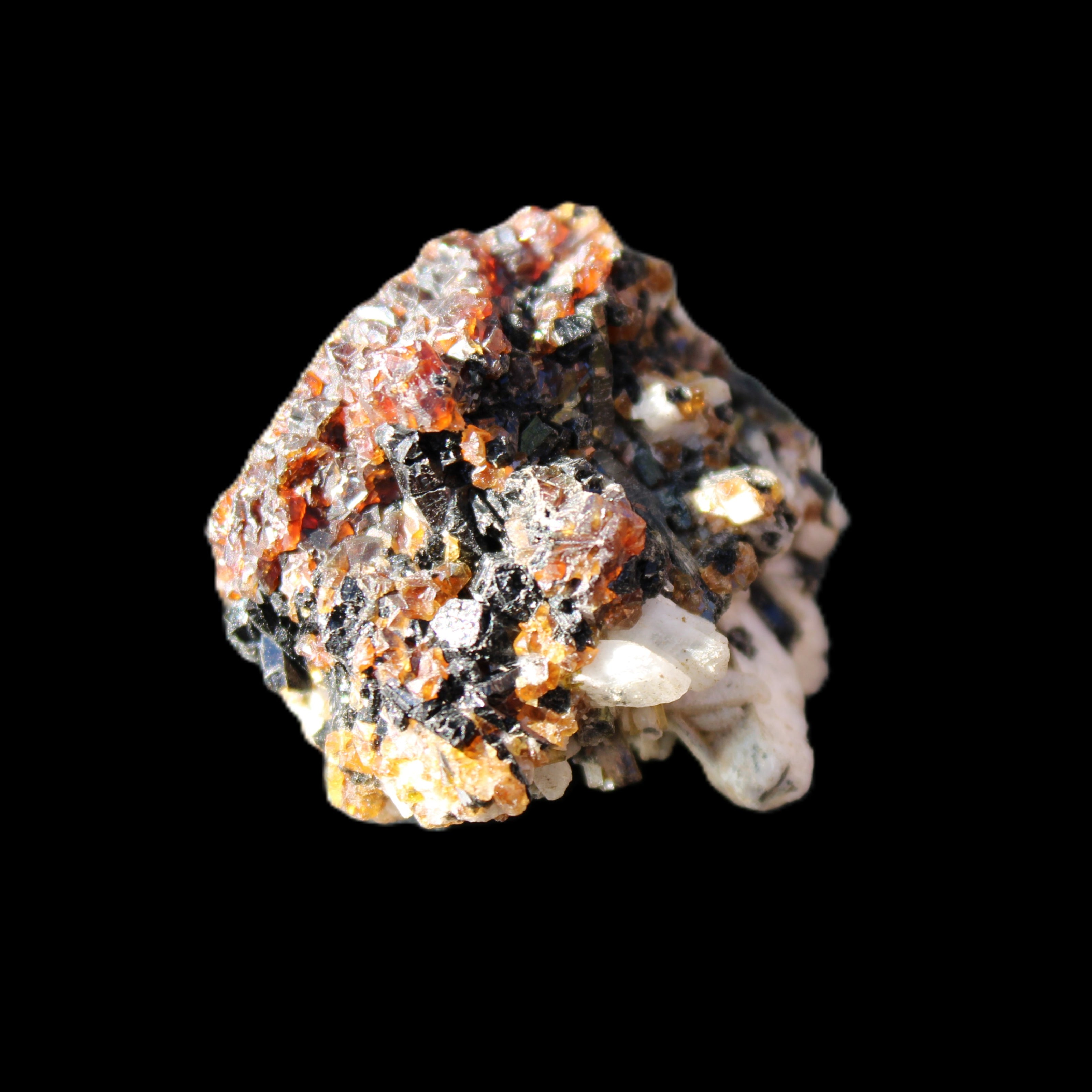 Red Zircon, Spessartine, Tourmaline on Epidote & Feldspar specimen 28*25*28mm 21g in sunlight - Rocks and Things Store